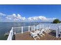 Relaxing rooftop deck offering breathtaking waterfront views at 2516 Avenue A, Bradenton Beach, FL 34217