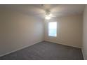 Bright bedroom with ceiling fan and window at 4850 51St W St # 8104, Bradenton, FL 34210