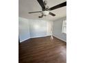 Living room with vinyl flooring and neutral walls at 515-519 2Nd Ave E, Bradenton, FL 34208