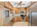 Modern kitchen with granite countertops and stainless steel appliances at 4440 Exeter Dr # N304, Longboat Key, FL 34228