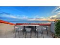 Spacious rooftop terrace with outdoor seating and stunning water views at 4557 Bay Club Dr, Bradenton, FL 34210