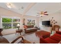 Cozy living room with comfortable seating, large windows, and tasteful decor at 607 Marcus St # 27, Venice, FL 34285