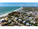 Aerial shot of the home and surrounding beach community close to the Gulf Coast at 116 50Th St, Holmes Beach, FL 34217