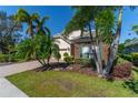 Beautiful house with a stone accent wall and nicely landscaped yard at 7223 Orchid Island Pl, Bradenton, FL 34202