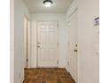 Simple entryway with tile floor, neutral walls, and doors to other rooms at 3141 Royal Tuscan Ln, Valrico, FL 33594