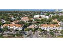 Aerial view showcasing the condo community's layout, with parking and nearby streets at 850 S Tamiami Trl # 227, Sarasota, FL 34236
