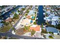 Bird's-eye view showcasing a single-Gathering home's location in a canal-front community at 9820 Royal Palm Dr, Bradenton, FL 34210