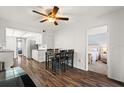 Open concept dining area with kitchen and bedroom views at 305 30Th W Ave # A208, Bradenton, FL 34205
