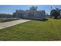 Front view of a single-story house at 3105 Sunrise Trl, Port Charlotte, FL 33952