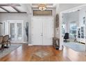 Bright and airy foyer with hardwood floors and access to formal dining area at 504 Mast Dr, Bradenton, FL 34208