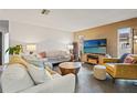 Cozy living room with comfortable seating, a large TV, and stylish decor for relaxing and entertaining at 5111 26Th St. Ct, W # 53, Bradenton, FL 34207