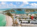 Aerial view showing condo location near beach and water at 1555 Tarpon Center Dr # 135, Venice, FL 34285