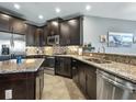 Modern kitchen with granite countertops and stainless steel appliances at 3450 77Th W St # 102, Bradenton, FL 34209