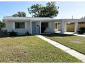 Recently remodeled home showcasing a clean and modern exterior at 1605 32Nd W St, Bradenton, FL 34205