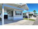 This single-story home features a convenient carport and well-kept surroundings in a beautiful community at 3333 26Th E Ave # 1107, Bradenton, FL 34208