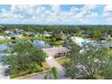 Aerial view of a single-Gathering home with a pool and lake access in a quiet community at 2215 39Th W St, Bradenton, FL 34205