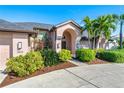 Well-maintained house featuring a circular driveway and lush landscaping at 4213 Pro Am E Ave, Bradenton, FL 34203