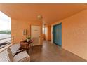 Building hallway with elevator access and seating area at 4550 Pinebrook Cir # 304, Bradenton, FL 34209