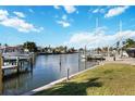 View of the canal and dock with boats at 806 Arlington Rd, Palmetto, FL 34221