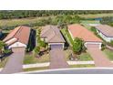 An aerial view of the home, highlighting its location in a golf course community at 12667 Sorrento Way, Bradenton, FL 34211