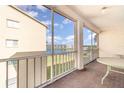 Screened balcony overlooking the lake and community at 3937 Lake Bayshore Dr # 401, Bradenton, FL 34205