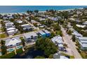 Aerial view showcasing a beautiful coastal community near the ocean at 7007 Holmes Blvd, Holmes Beach, FL 34217