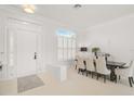 Bright dining area with white walls and modern furnishings at 2112 Calusa Lakes Blvd, Nokomis, FL 34275