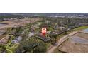 An aerial view showcasing the property's position in a residential development at 5231 Brassy Loop, North Port, FL 34287
