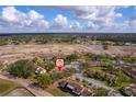 Aerial view showing the location of the property within a larger community at 5231 Brassy Loop, North Port, FL 34287
