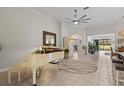 Open concept living area with views into kitchen and dining area at 608 Misty Pond Ct, Bradenton, FL 34212