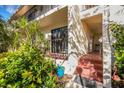 Condo building exterior with entrance and landscaping at 6462 Wild Oak Bay Blvd # 247, Bradenton, FL 34210