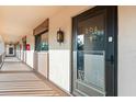 Residential hallway with access to unit 204 at 2522 Clubhouse Dr # 204, Sarasota, FL 34232