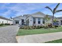 Attractive home with lush landscaping and healthy green lawn in a well-kept neighborhood at 8035 Redonda Loop, Bradenton, FL 34202