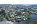 Property situated on a canal with a large backyard at 4678 Silent Creek Way, Nokomis, FL 34275