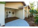 Front entrance with a white door and a decorative wreath at 5131 Willow Leaf Dr, Sarasota, FL 34241