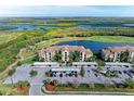 Condo community with ample parking and scenic landscape at 7005 River Hammock Dr # 103, Bradenton, FL 34212