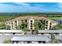 Condo building with covered parking and scenic views at 7005 River Hammock Dr # 103, Bradenton, FL 34212