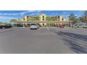 Condo building with covered parking and landscaping at 7005 River Hammock Dr # 103, Bradenton, FL 34212