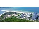 Aerial view of beachfront property and surrounding area at 2110 Benjamin Franklin Dr # 105, Sarasota, FL 34236