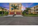 Three-story luxury home with two-car garage and waterfront access at 6418 Margarita Shores Ln, Apollo Beach, FL 33572