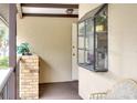 Small condo balcony with storage and seating at 380 Three Lakes Ln # L, Venice, FL 34285