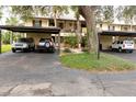 Condo parking with covered carport spaces at 380 Three Lakes Ln # L, Venice, FL 34285