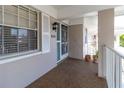 Exterior condo entryway with screen door at 636 Estuary Dr # 636, Bradenton, FL 34209