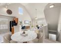 Open living room and kitchen with high ceilings and modern decor at 5560 Rosehill Rd # 201, Sarasota, FL 34233