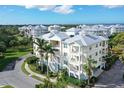 Aerial view of building, showcasing its exterior and landscaping at 7840 34Th W Ave # 203, Bradenton, FL 34209