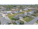 Aerial view of a single-Gathering home with a carport and surrounding neighborhood at 1521 Graber Ave, Sarasota, FL 34239