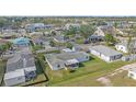Aerial view of a house with a backyard, showcasing the property and neighborhood at 1521 Graber Ave, Sarasota, FL 34239