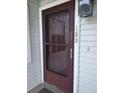 Exterior view of building with brown front door at 515 Leffingwell Ave # 109, Ellenton, FL 34222
