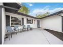 Inviting front porch with seating area, perfect for relaxing outdoors at 530 Saint Andrews Dr, Sarasota, FL 34243