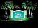 Night view of Tara Golf & Country Club private entrance sign at 6501 Stone River Rd # 203, Bradenton, FL 34203